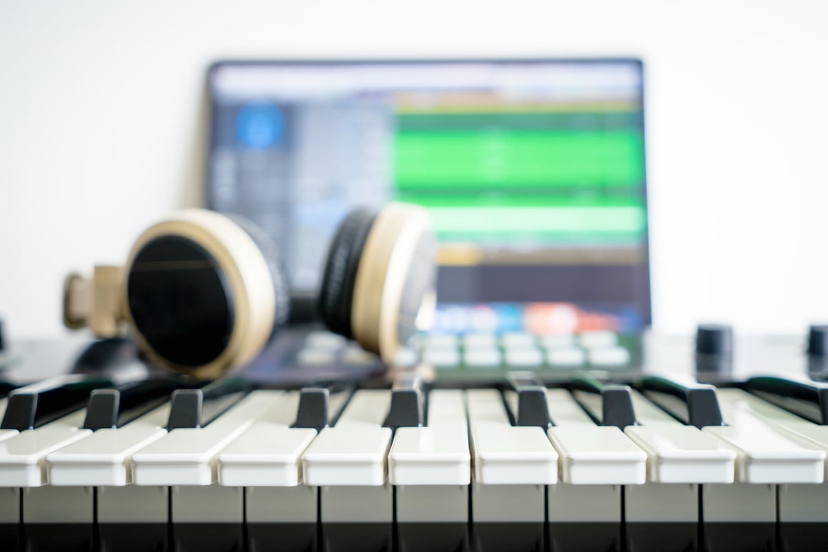 Music keyboard and Music mixing headphone on computer music station